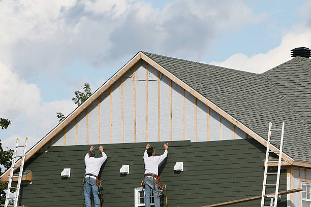 Professional Siding Contractor technician working in Clarksburg, MD